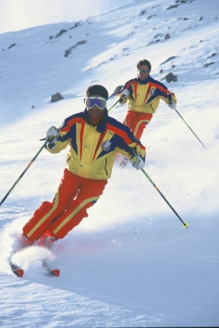  Skiers going down the slope 